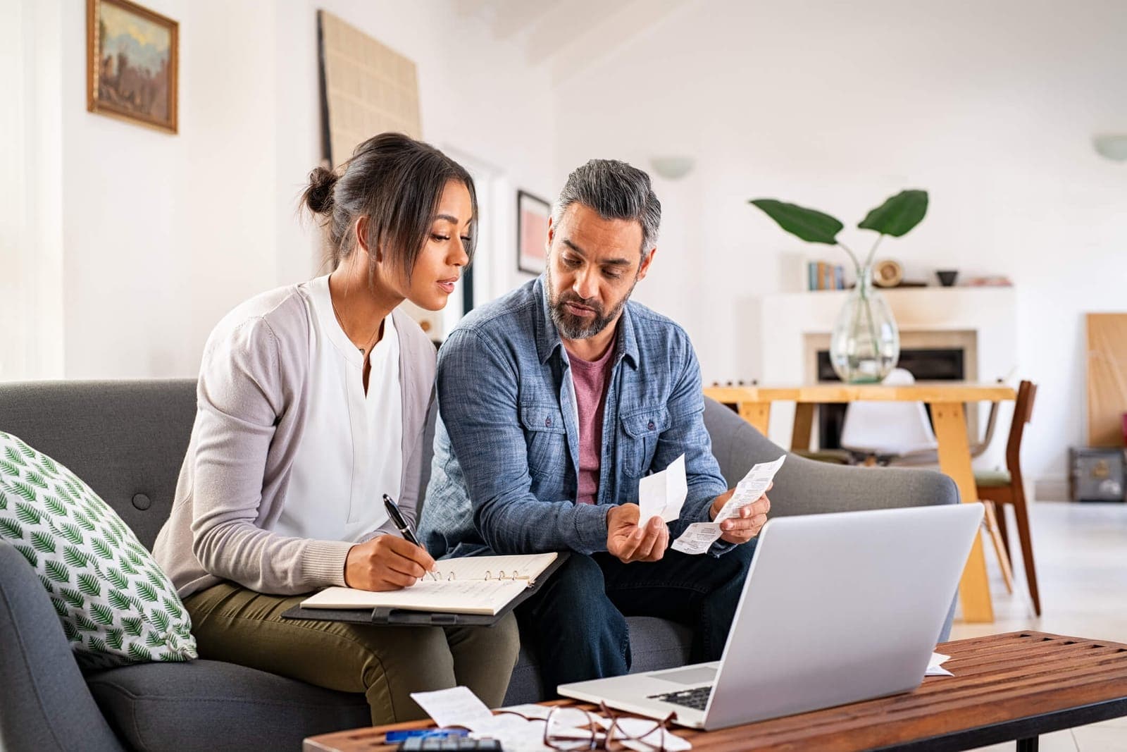 A bookkeeper working through a backlog with a client