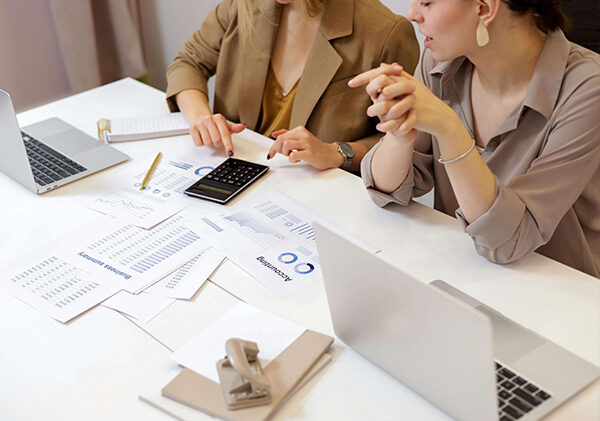 two-women-discussing-financial-documents